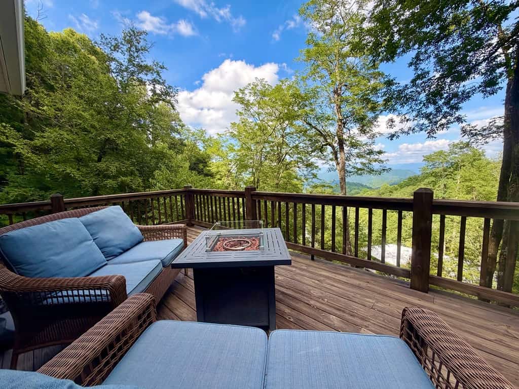 Elevated mountain-view cabin with private hot tub, 2 decks, firepit, & grill