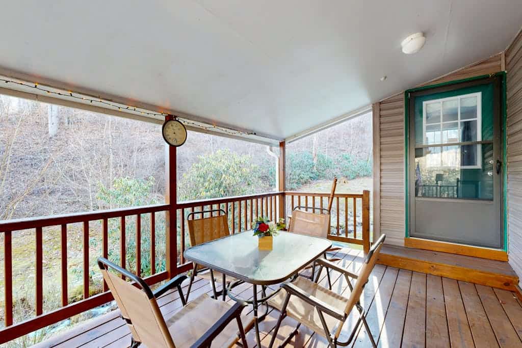 Mountain view home with a fireplace with beautiful view of the creek