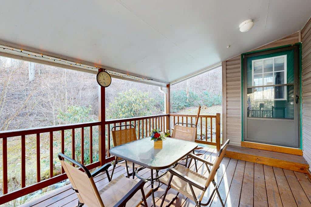 Mountain view home with a fireplace with beautiful view of the creek