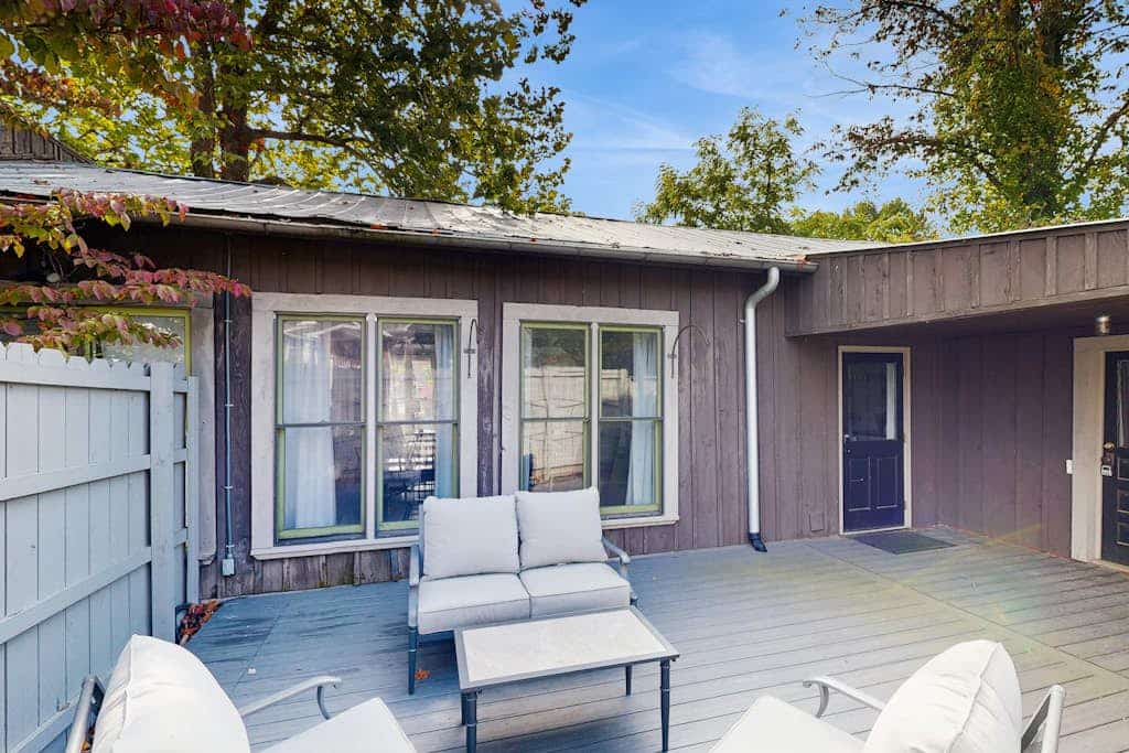 Historic 2 bedroom home with wood-burning fireplace and river front views