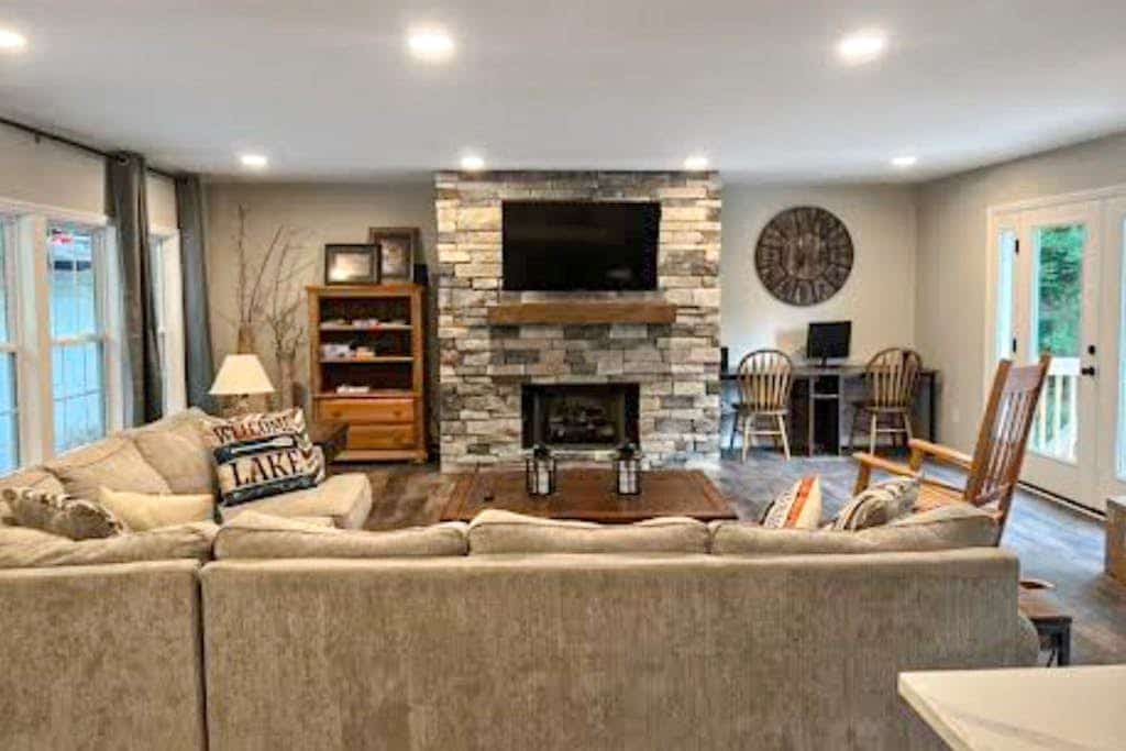 Escape near the lake with game room, firepit, deck, Hot Tub & open-concept