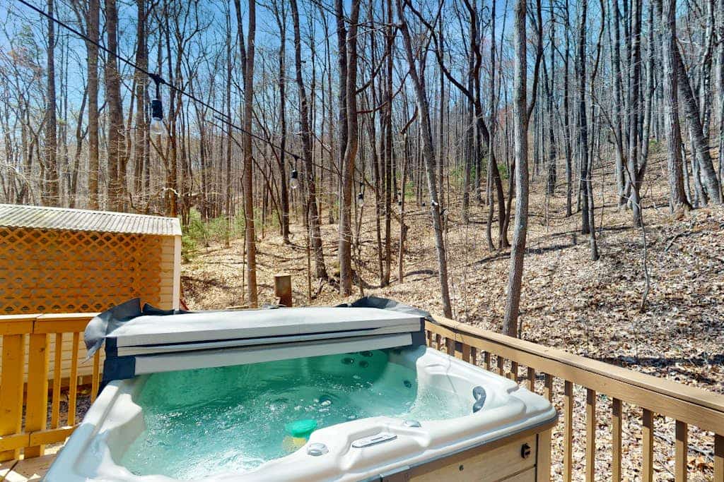 Dog-friendly rustic home with private hot tub, mtn views, wraparound deck, W/D