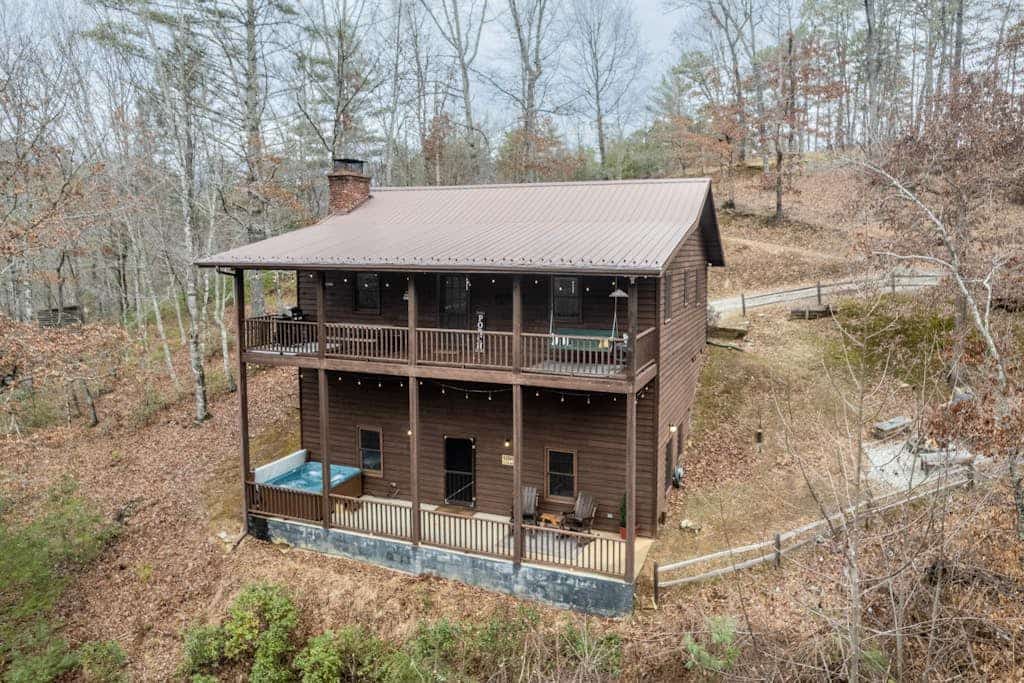 Dog-friend mtn home near pond with private hot tub, fireplace, decks, & firepit