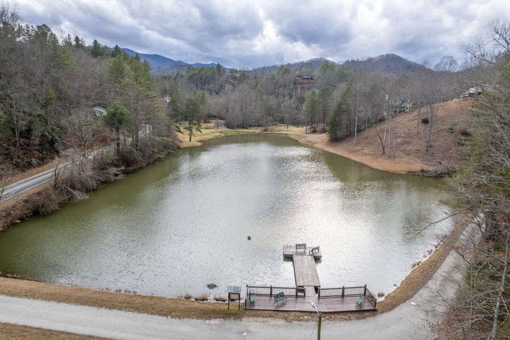 Dog-friend mtn home near pond with private hot tub, fireplace, decks, & firepit