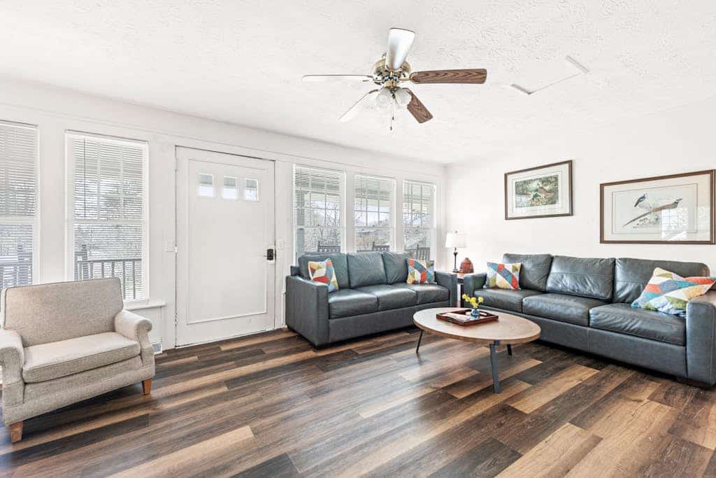 Dog-friendly home with updated kitchen, central AC, washer/dryer, porch, pool