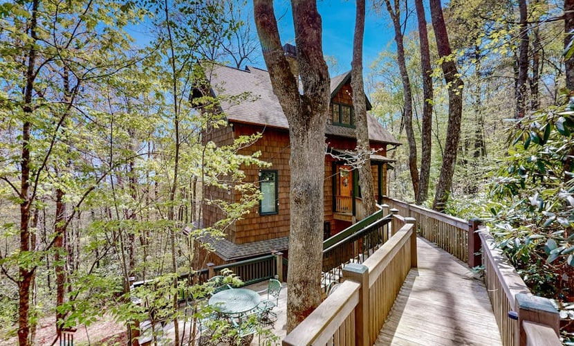 Luxe home overlooking Blue Valley & a stream with elevator & designer interior