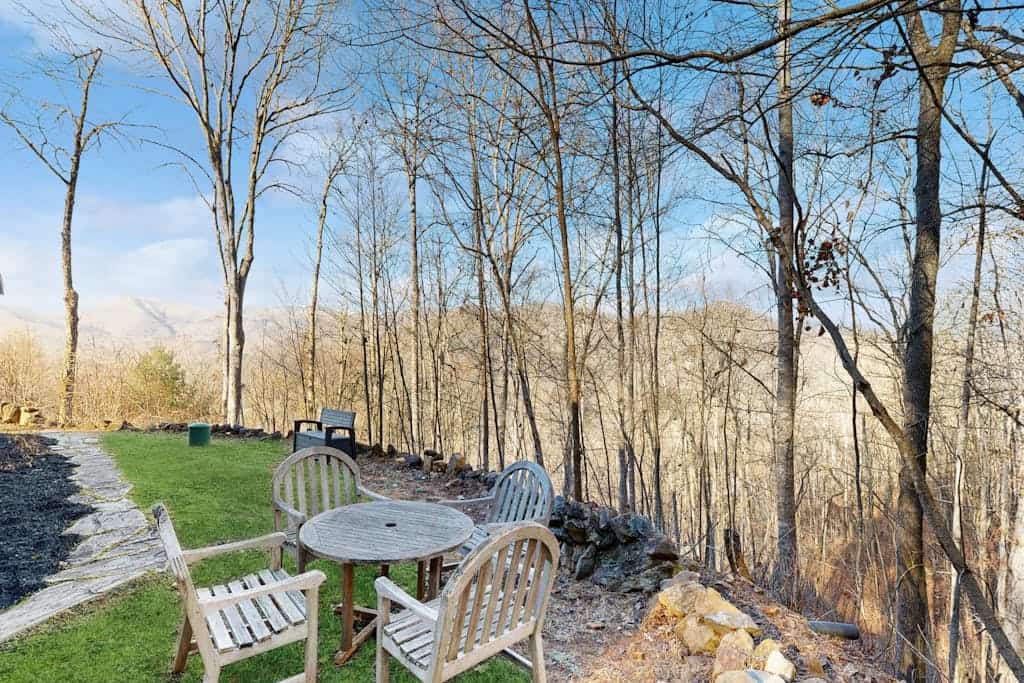 Cabin with stunning mountain views, porch, fire pit & dog-friendly!
