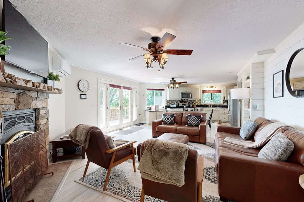 Mountain- & lake-view home with wraparound deck, firepit, & W/D - near dining