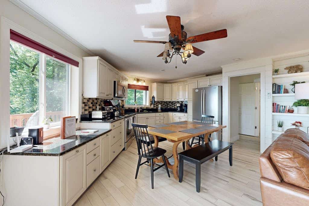 Mountain- & lake-view home with wraparound deck, firepit, & W/D - near dining