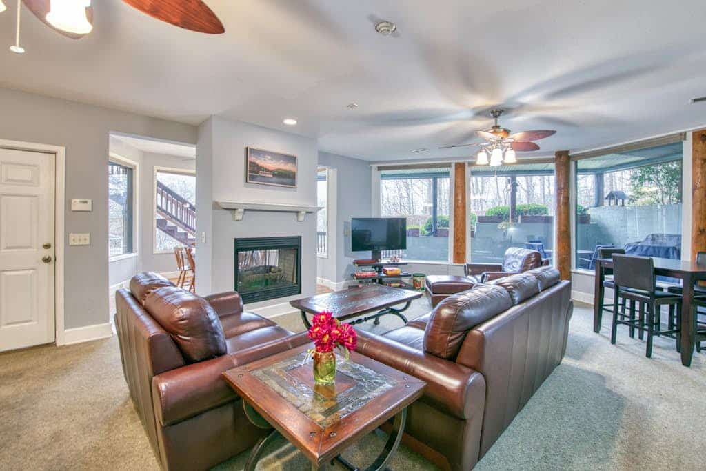 Lower level unit in duplex with AC, fireplace, washer & dryer, community pool