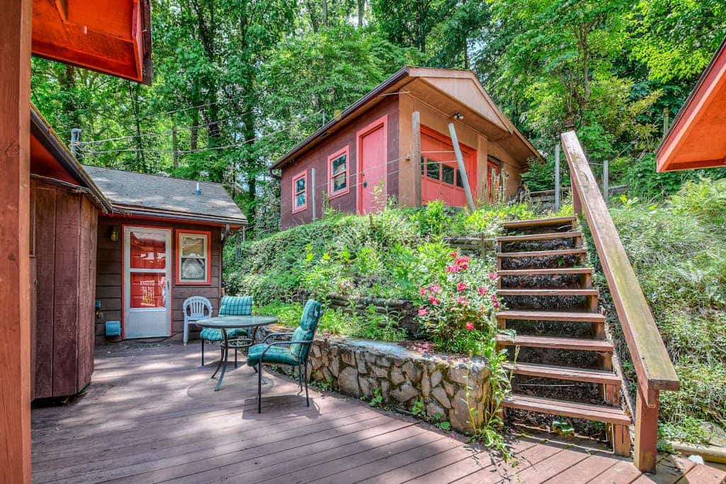 Upper unit lakefront home with lake views, wood fireplace, shared outdoor pool