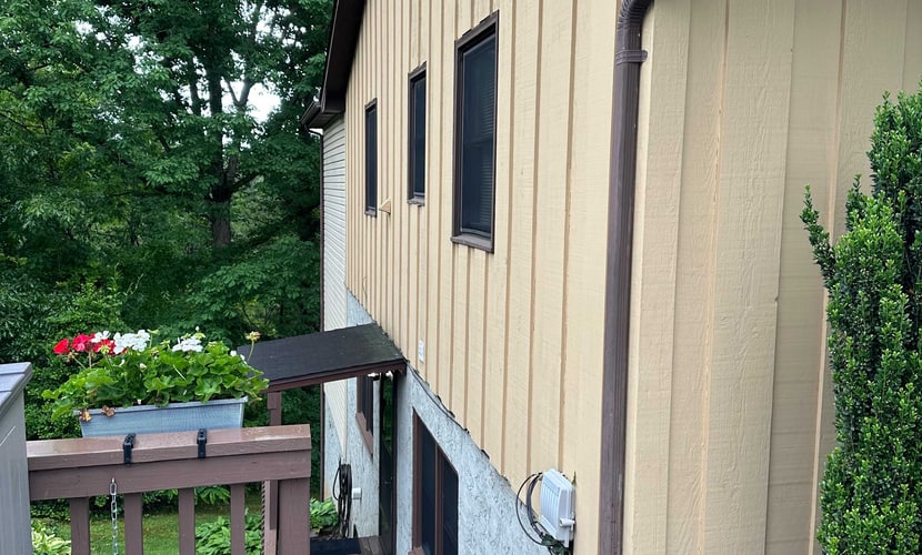 Lower-level lake retreat with mountain views, pool, central AC, deck, grill