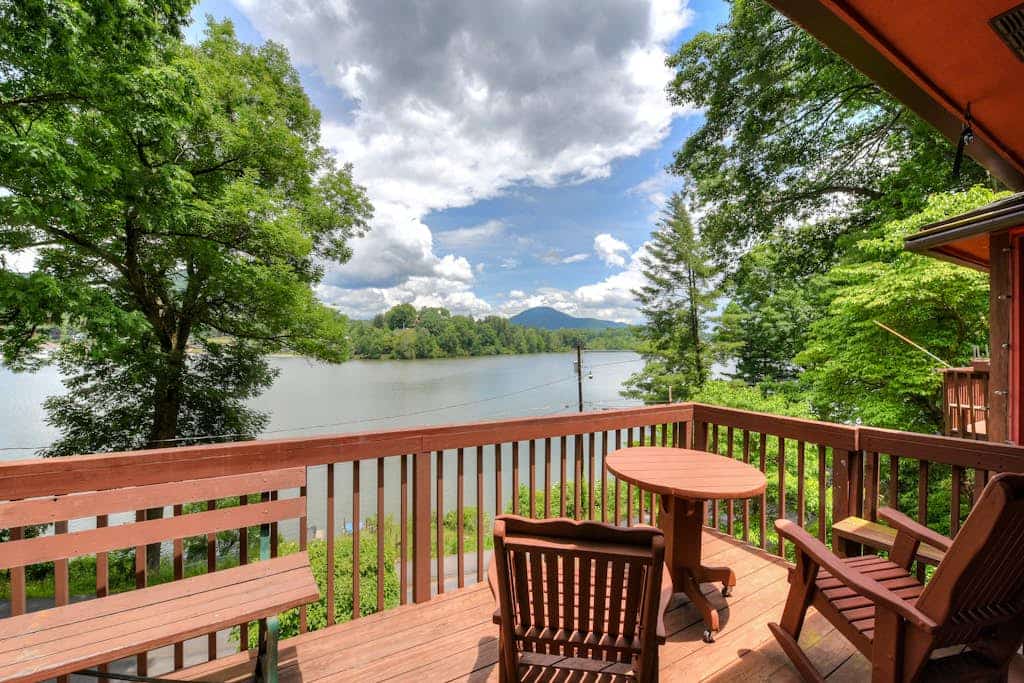 Spacious two-story lakefront home with lake views, balcony, AC, pool & tennis