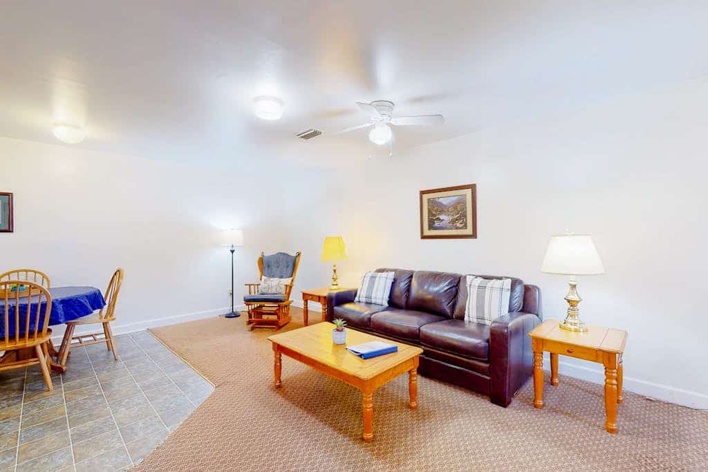 Quaint condo across from the lake with shared lakeside pool and trails - dogs OK