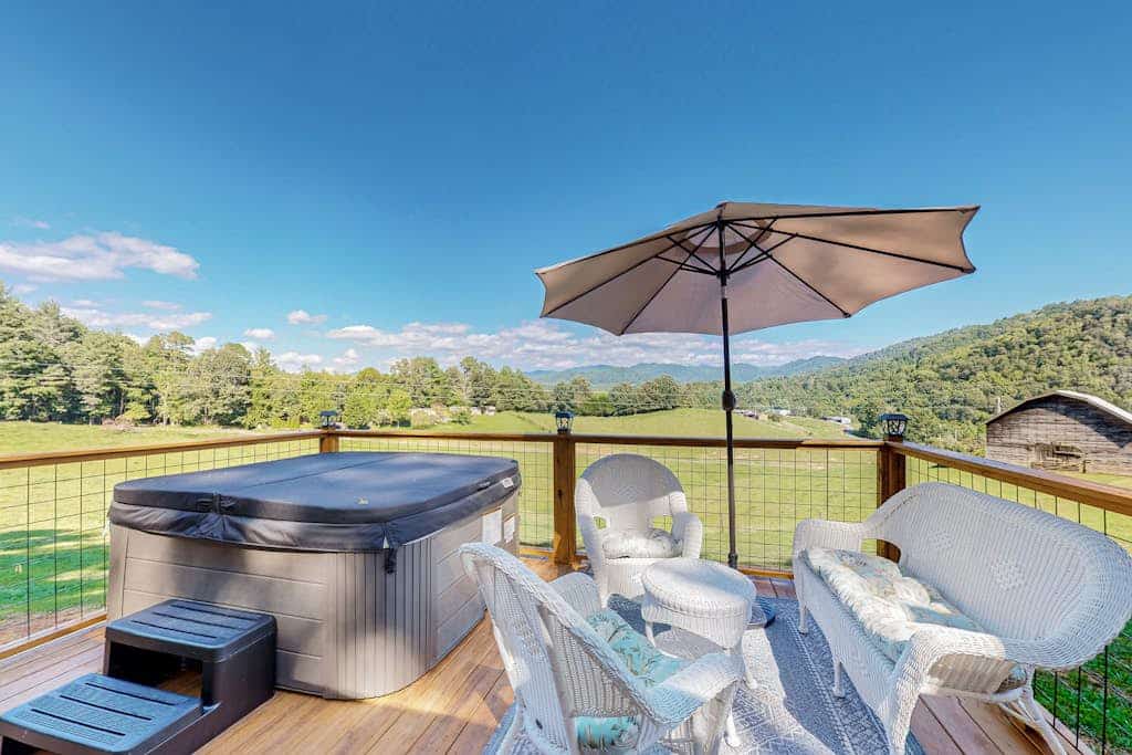 2 Tiny home cabins with private hot tubs, covered porches, & amazing views