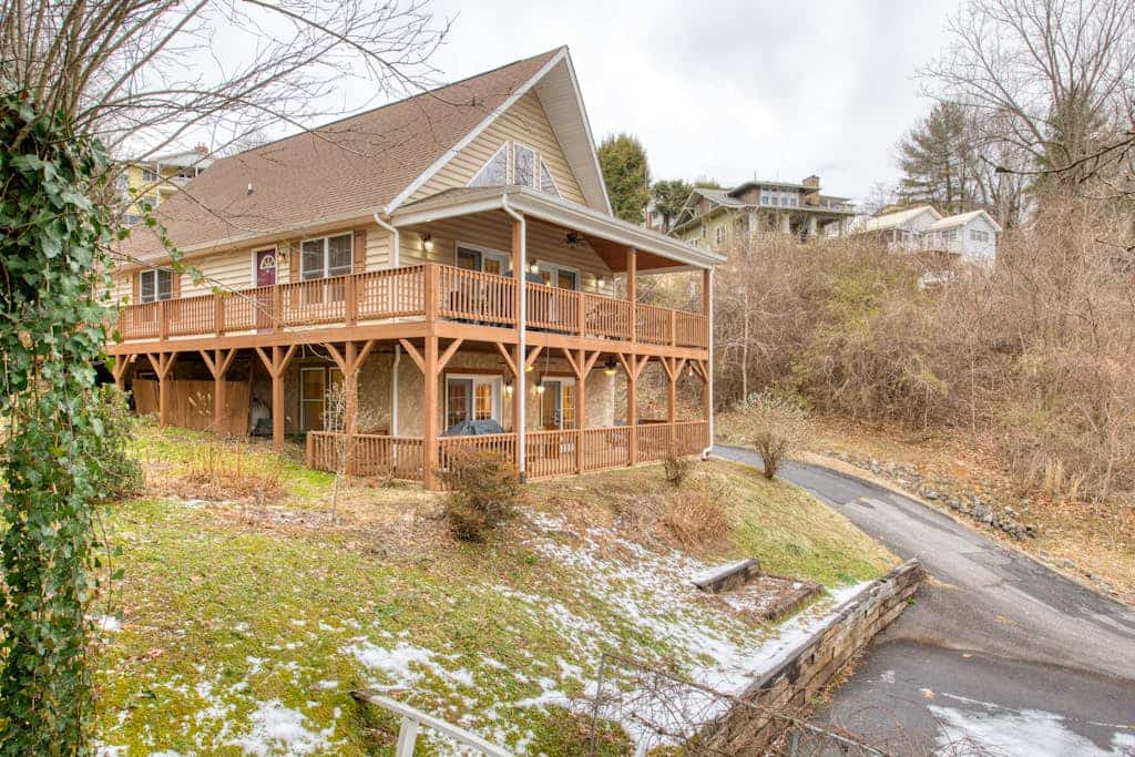 Open and modern upper-level space with WiFi, central AC, pool, wraparound deck