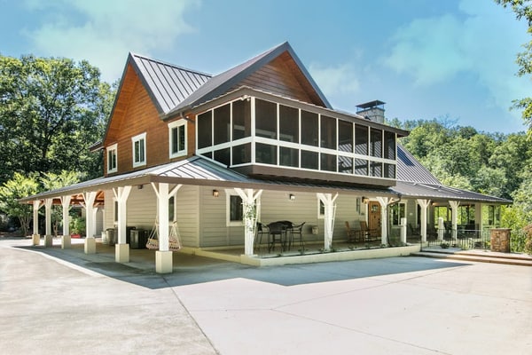 Riverside opulence with game room, private heated pool, hot tub & firepit