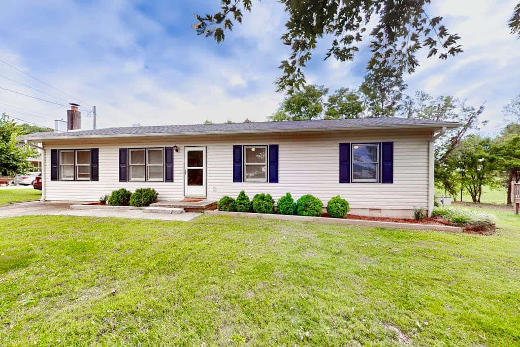 Well-located home in town with sunrise views, deck & great backyard