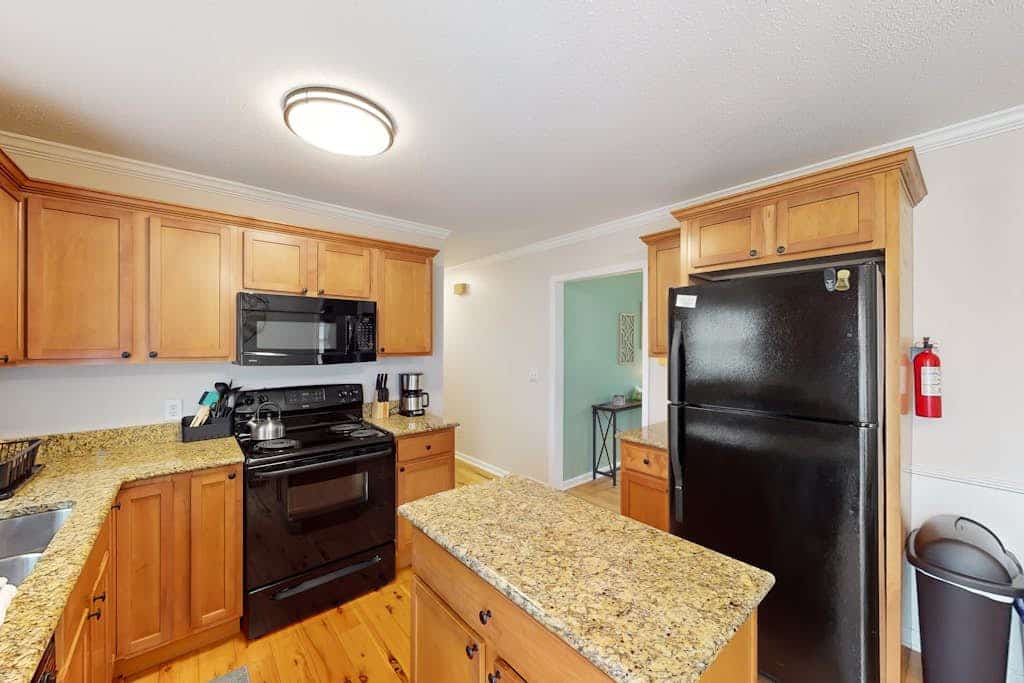 Well-located home in town with sunrise views, deck & great backyard