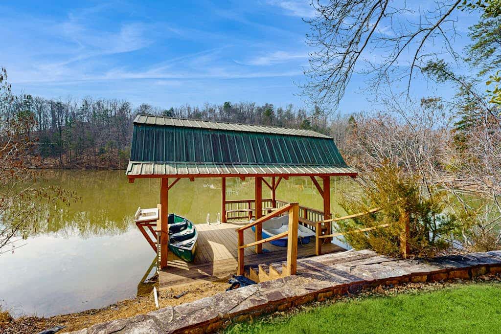 Dog-friendly lake front home with private dock and mountain views