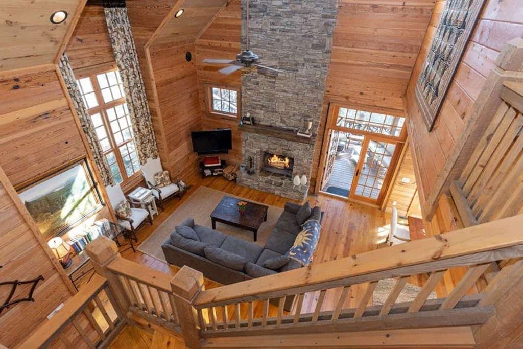 Fairy tale home among the trees with a hot tub, multiple decks & fireplaces