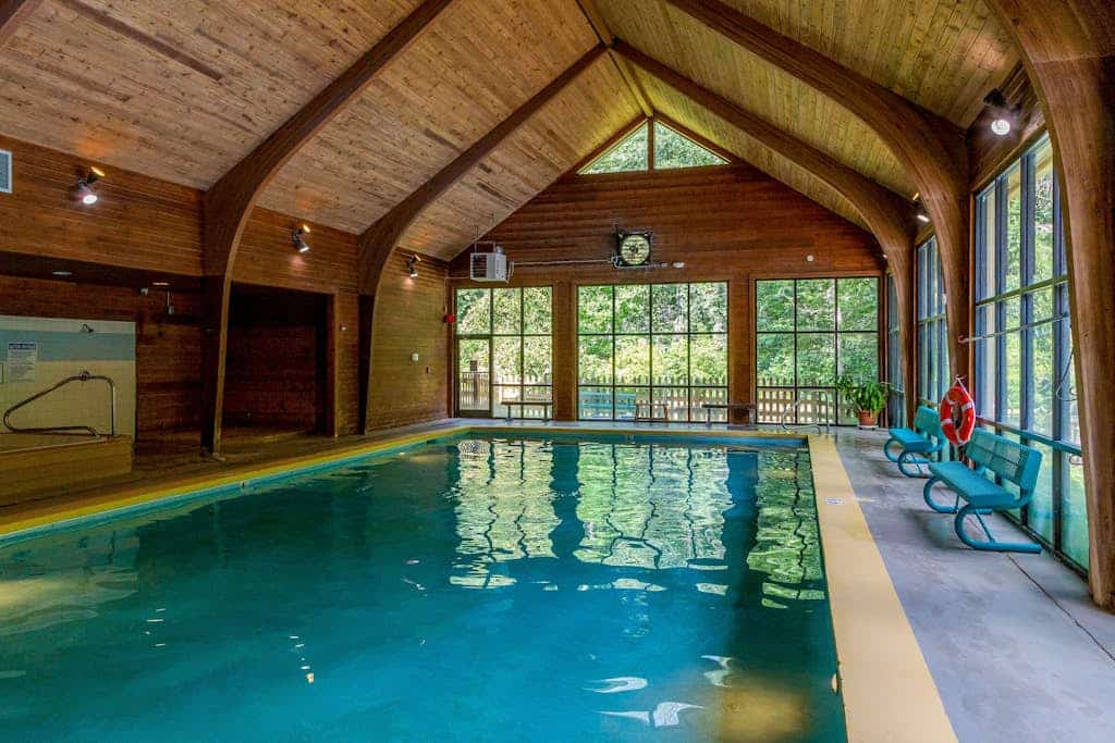 Mountain-view condo with pools, hot tub, sauna, tennis, game room, & balcony