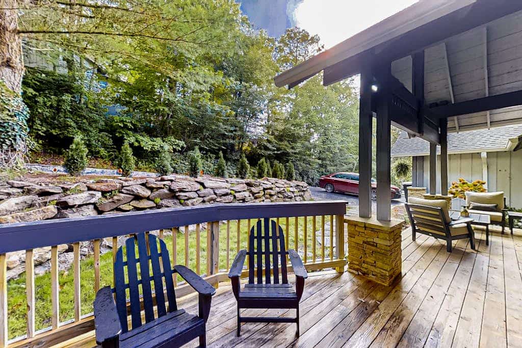 Dog-friendly home with private deck, outdoor fireplace, & immaculate interior