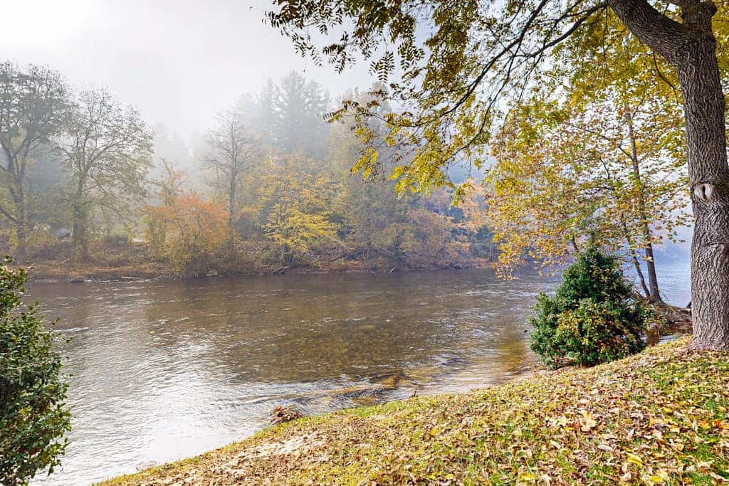 Take in the natural beauty from this elegant riverfront home