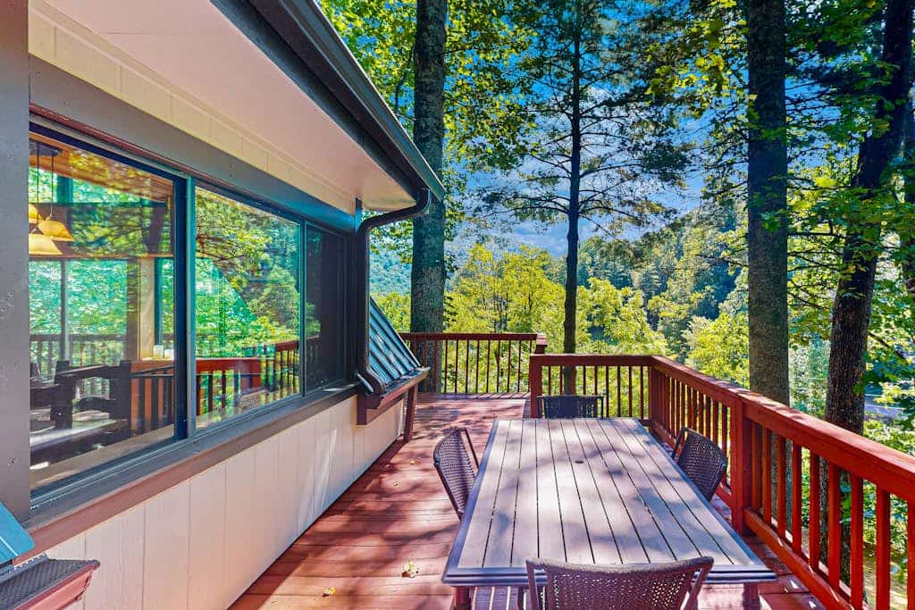 Spacious, dog-friendly A-frame cabin with a furnished deck, gas fireplace, & AC