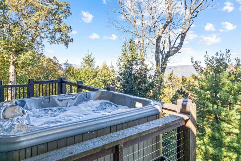 Secluded Smoky Mountain home with panoramic views, wood stove, & hot tub