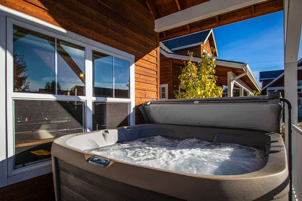Sunlit, dog-friendly home with hot tub, gas fireplace, & washer/dryer