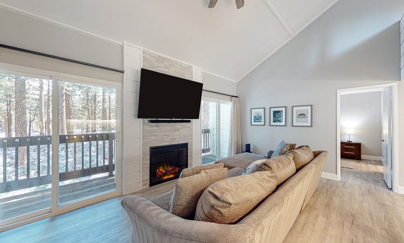 Two-story condo with fireplace, pool, hot tub, sauna & great location