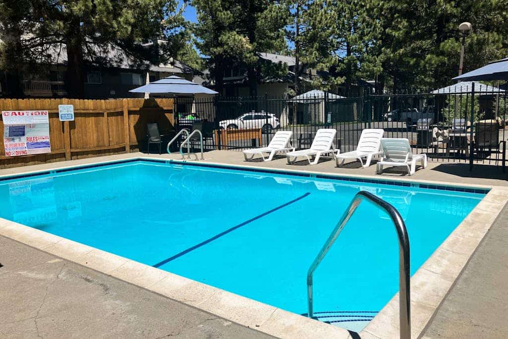 Two-story condo with fireplace, pool, hot tub, sauna & great location