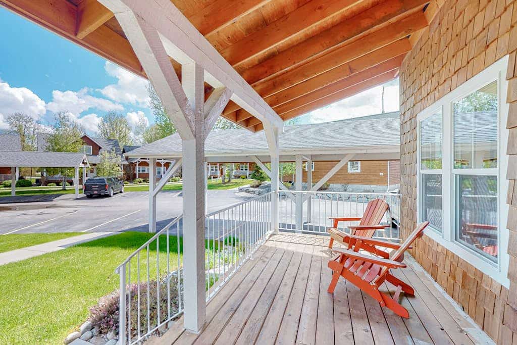 Adorable, two-story home with a furnished front porch, fireplace, & washer/dryer