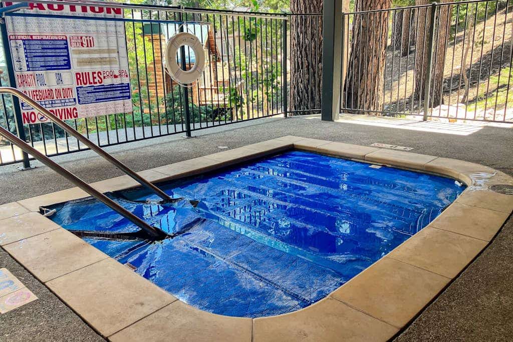 All-season condo with hot tub, deck, sauna, wood stove & washer/dryer