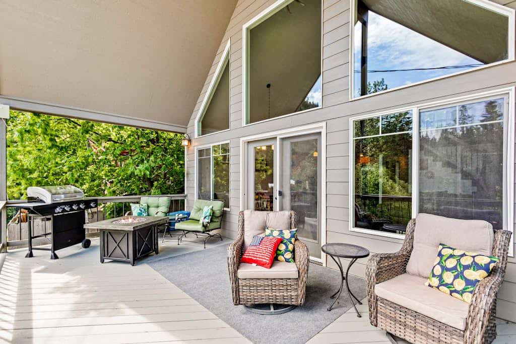 Beautiful 3-story home with lake/bay views, deck, grill, firepit & fireplace
