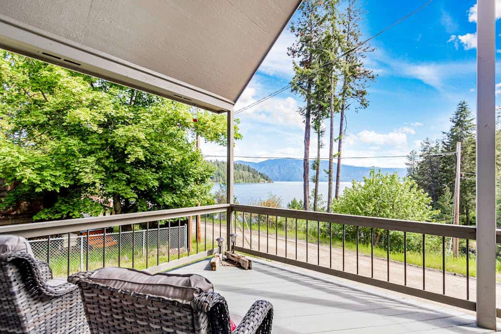 Beautiful 3-story home with lake/bay views, deck, grill, firepit & fireplace