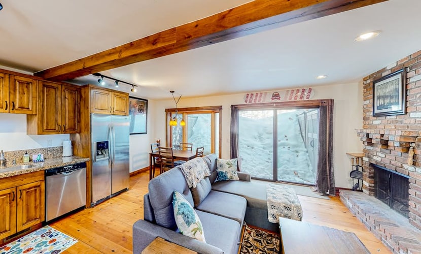 Inviting riverfront home with balcony, fireplace, skiing, W/D & dog-friendly