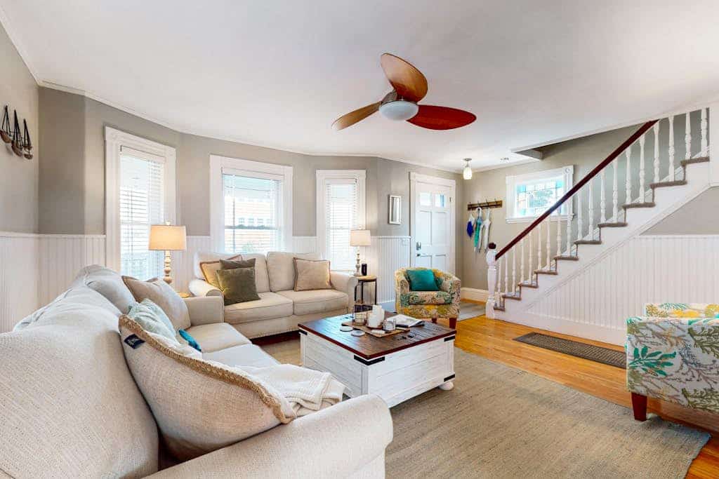 Classic charmer near the coast with with a firepit, outdoor shower, & beach gear