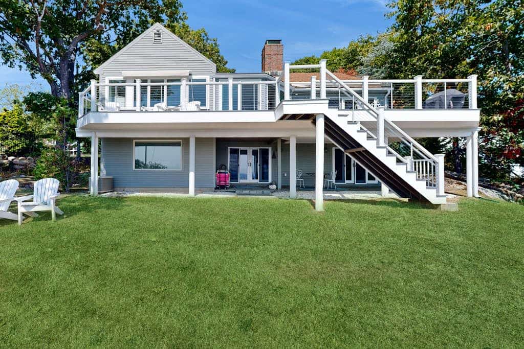 Modern oceanfront home with scenic deck, grill, games, chef's kitchen, & W/D