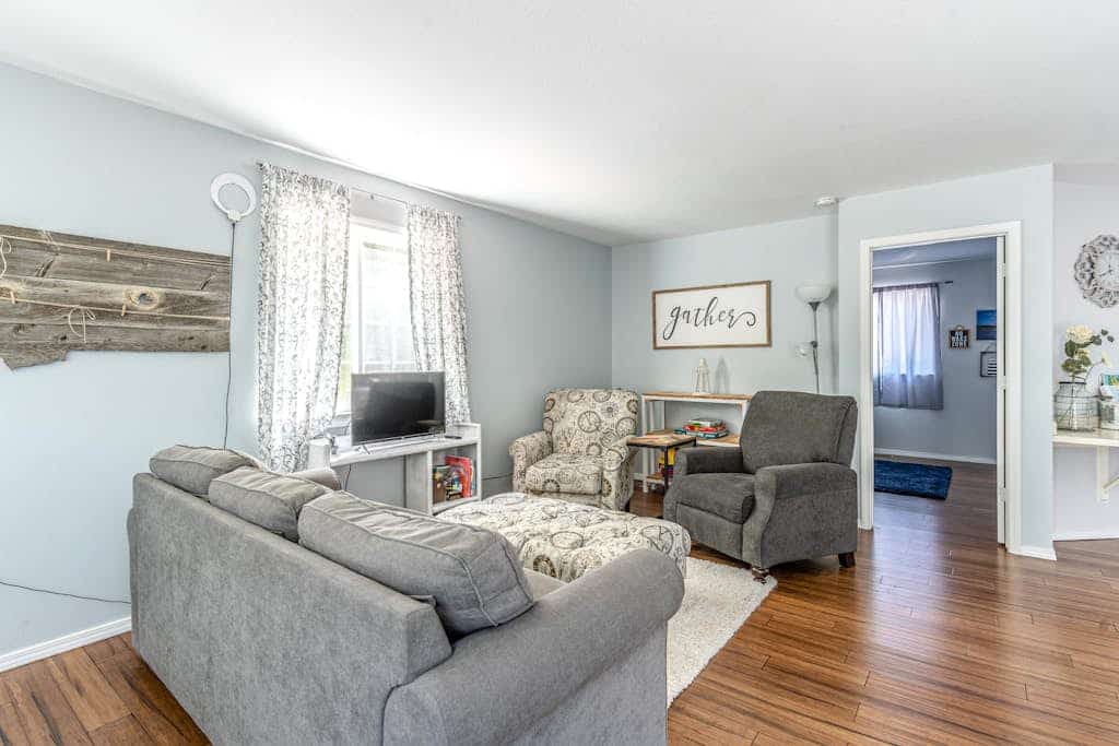 Mountain-view home with large deck, gas grill, firepit, lawn, and central AC
