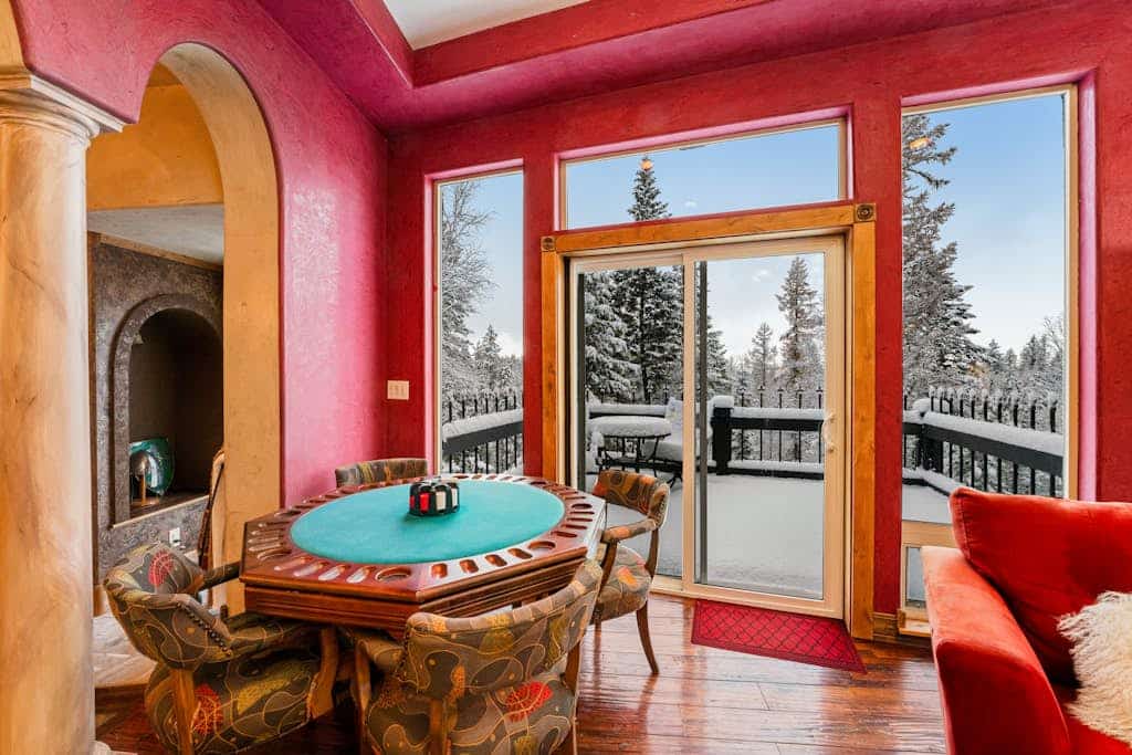 Whimsical acreage with high-end finishes, old-world character, air hockey, & W/D