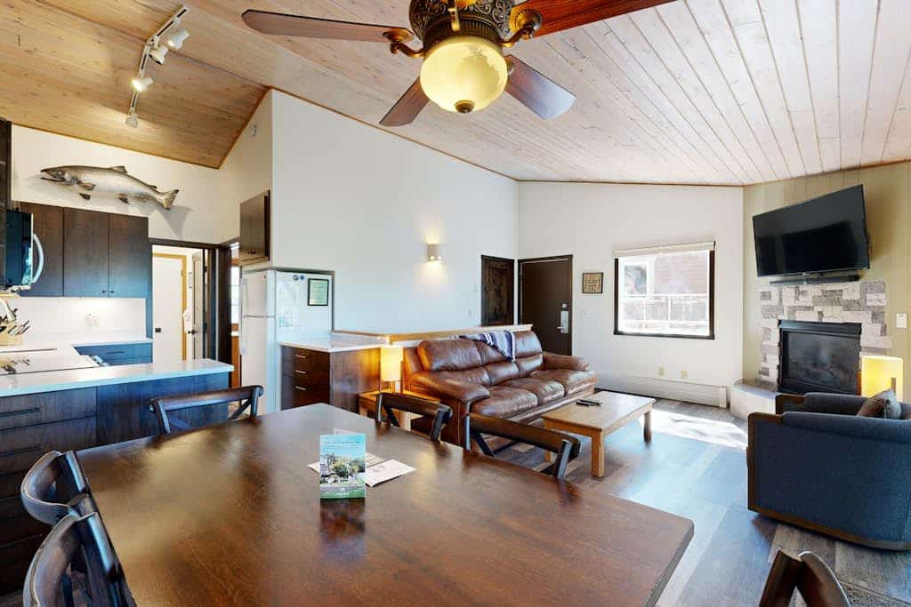 Lake-view home with private beach access, pool, hot tub & sauna