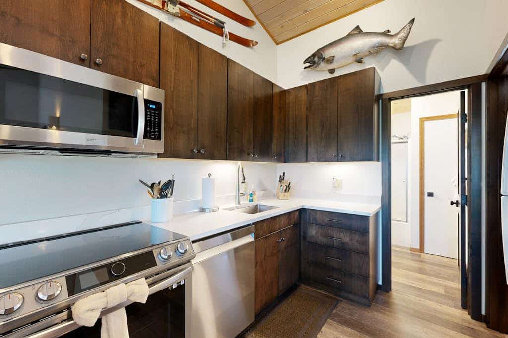 Lake-view home with private beach access, pool, hot tub & sauna