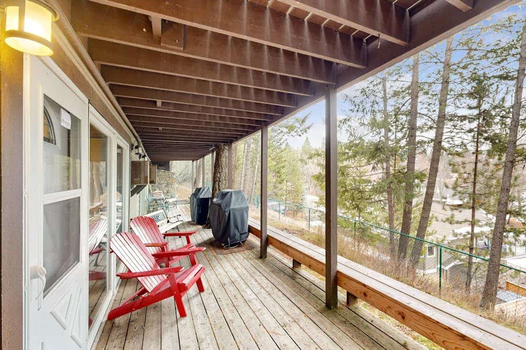 Dog-friendly condo near beach with lake views, hot tub, sauna, pool, dock, grill