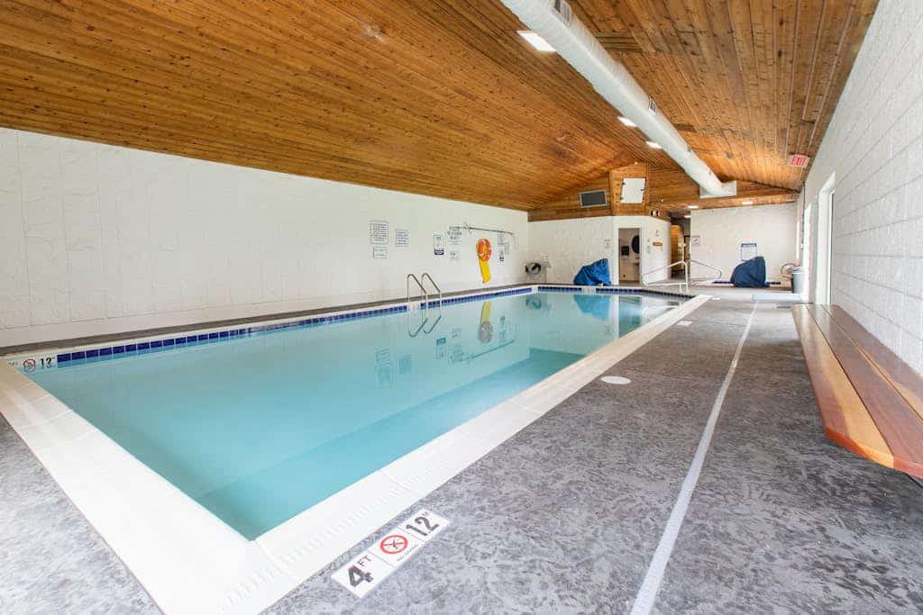Dog-friendly condo near beach with lake views, hot tub, sauna, pool, dock, grill