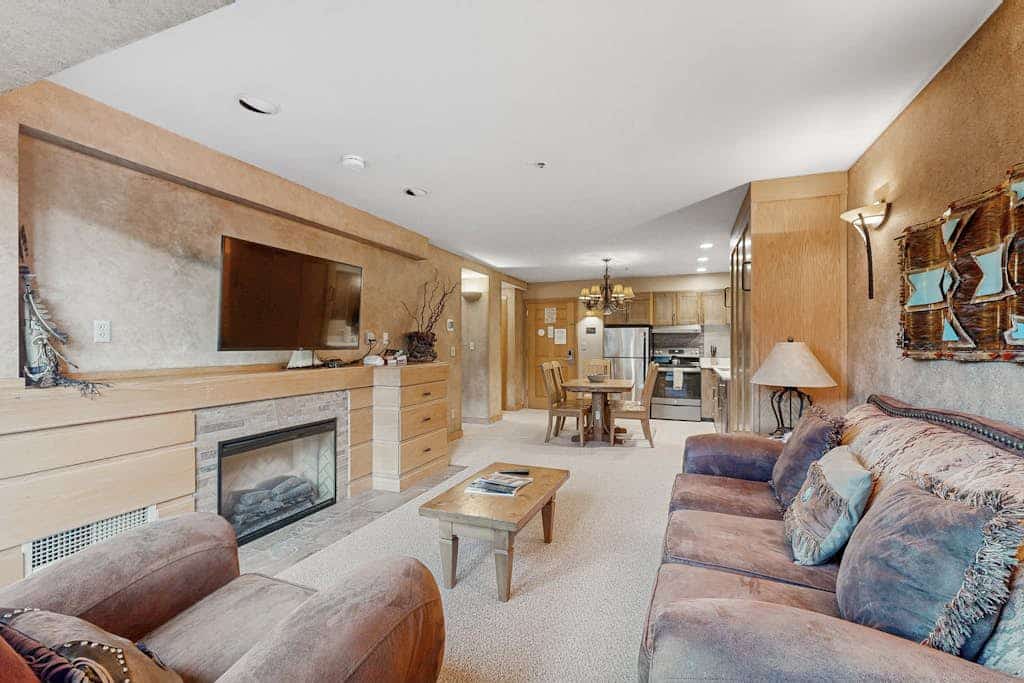 Ski-in/out condo with mountain view, hot tub, pool, & fireplace