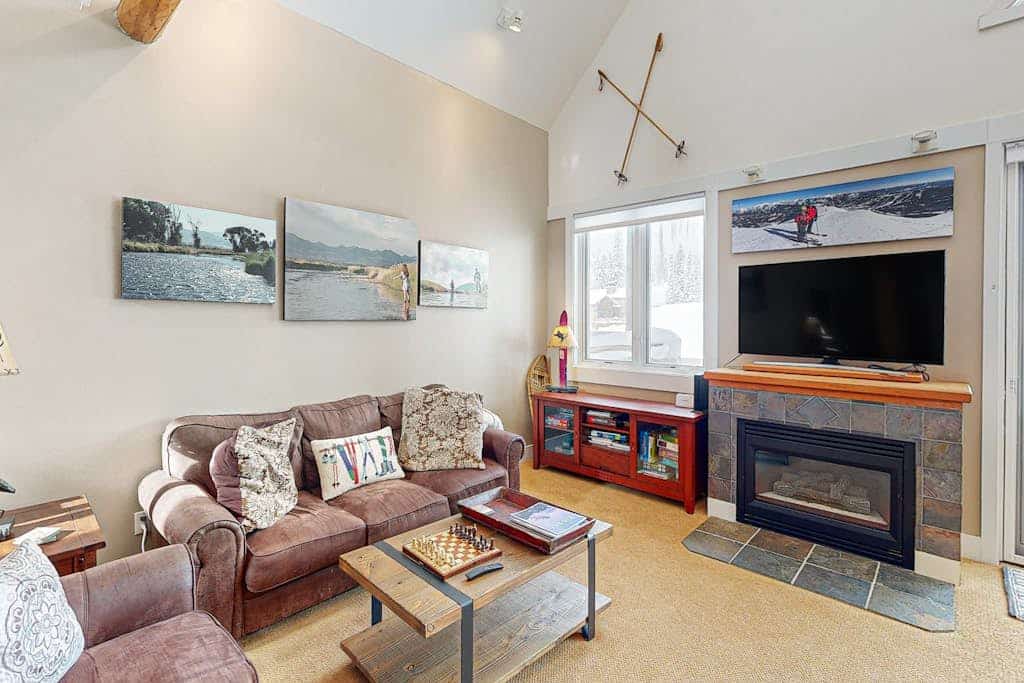 Serene mountain-view condo with skiing, washer/dryer, gas grill, & patio