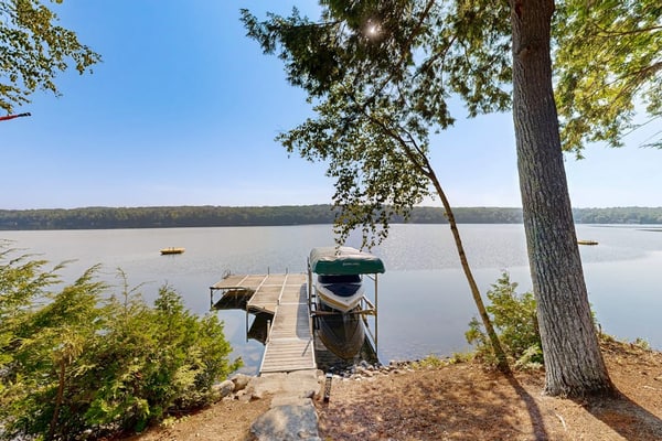 Belgrade Lakes getaway with private swim dock, outdoor living, & canoe/kayaks