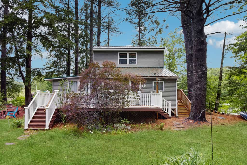 Entire lakefront home on Togus Pond with decks, canoe, firepit & great view